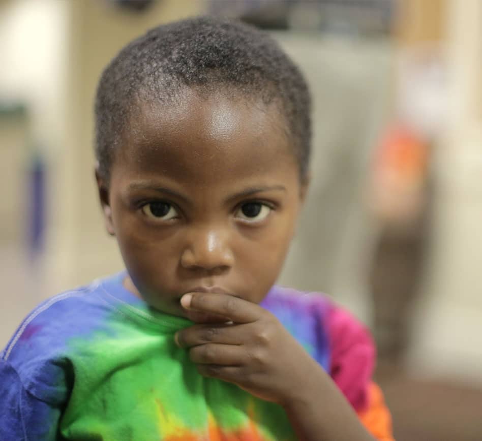 Child-Refugee Child Putting Finger over Mouth